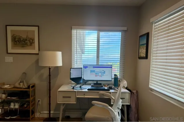 a room with furniture and a window