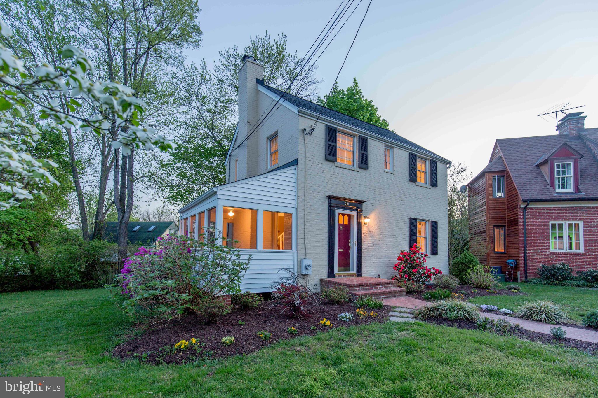 310 Brewster Court Silver Spring, MD 20901 - Photo 1 of 30 a front view of house with a garden