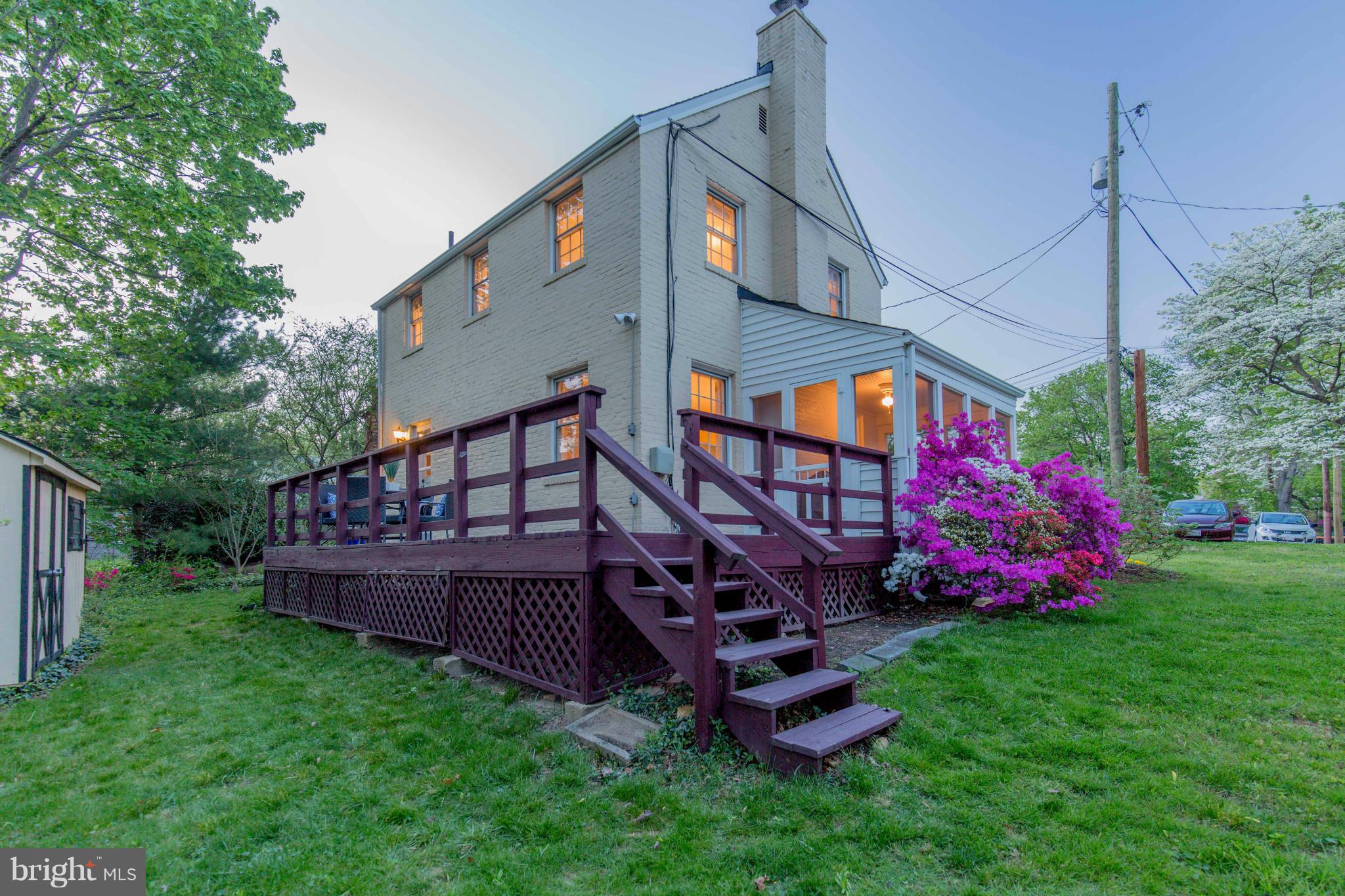 310 Brewster Court Silver Spring, MD 20901 - Photo 2 of 30 a view of a wooden deck with a yard