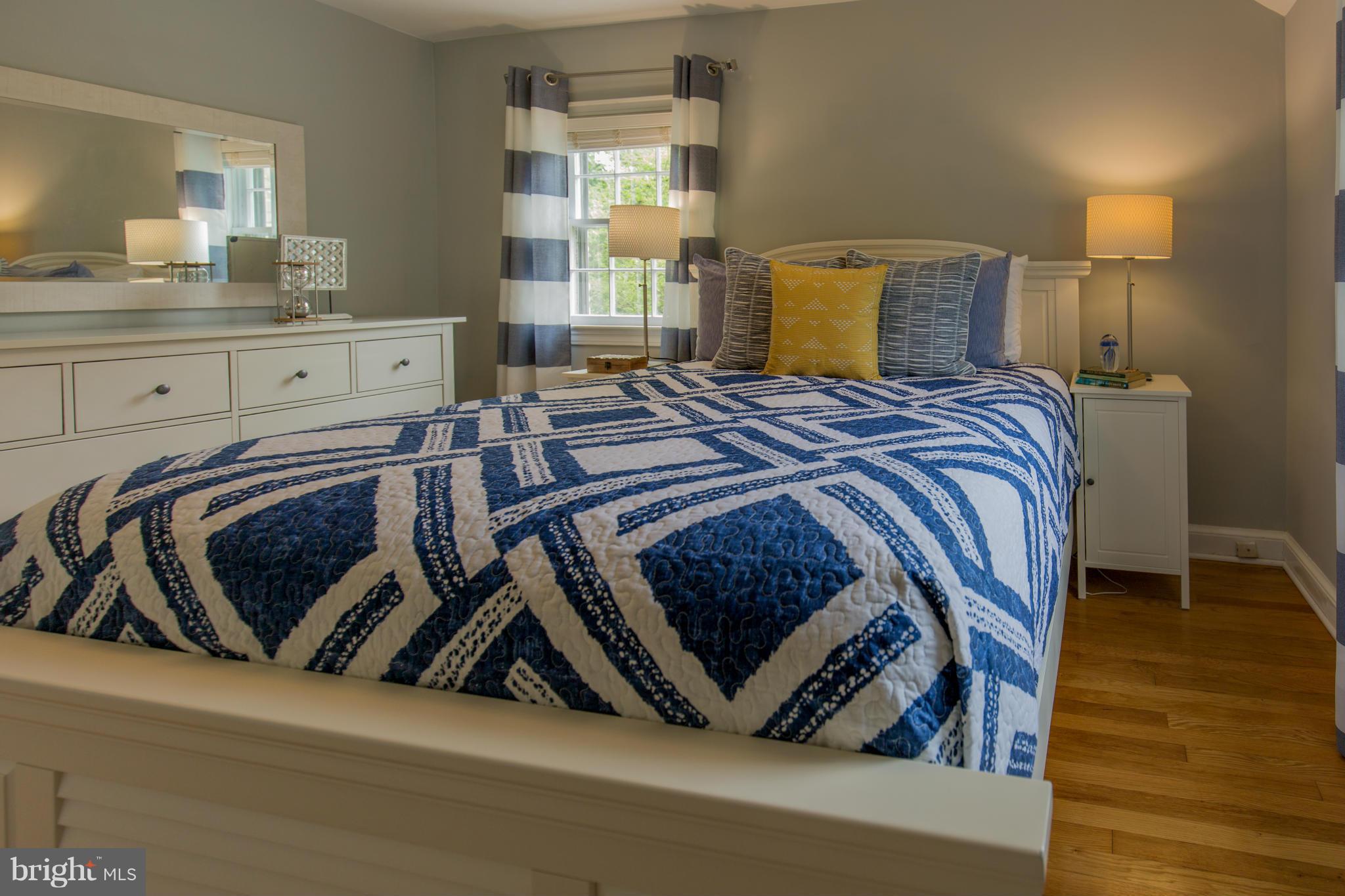 310 Brewster Court Silver Spring, MD 20901 - Photo 16 of 30 a bedroom with a bed and window