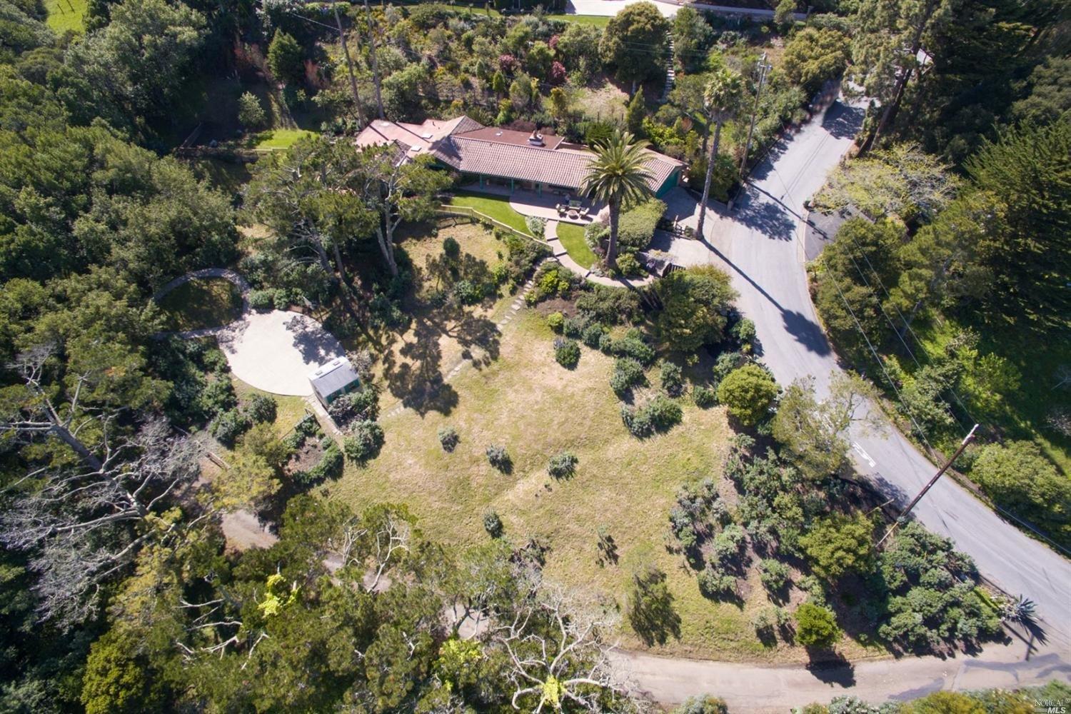 131 Taylor Road Tiburon, CA 94920 - Photo 1 of 1 Private, bucolic estate living! Exceptional one-acre single level estate view property with incredibly architectural detail. Festive & inviting 4+BD/3BA, 2535 SqFt, live in as-is or build your dream estate! With a vast architectural heritage spanning many centuries, Spanish style haciendas express rugged, romantic beauty with traditional architectural details and handcrafted elements. Spirited and imaginative & all about family, friends, and entertaining in a comfortable and relaxed environment. Thick masonry walls coated in stucco and red tile roofs function to keep the interior cool along with the radiant heat during the winter months. The one acre property is breathtaking & vast in scale with resort style living. Peaceful and tranquil with panoramic water views across the Bay, numerous palm trees, lush exotic landscape & fruit trees. Expansive level yard areas & a basketball court offering hours of family fun with the adjacent “play shed” for storage, toys or p