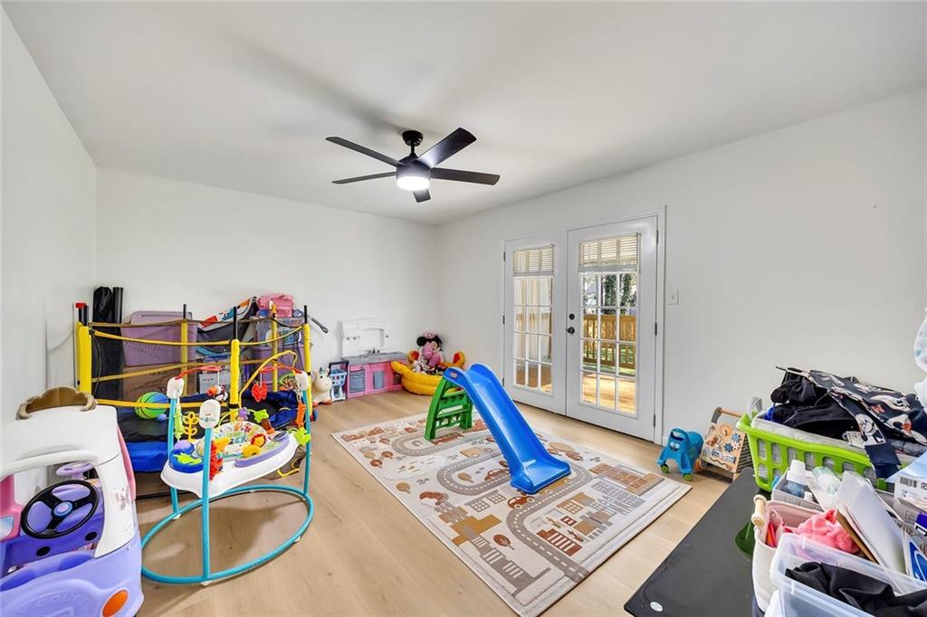 2328 Carnes Road Jonesboro, GA 30236 - Photo 18 of 36 a living room with furniture and a table