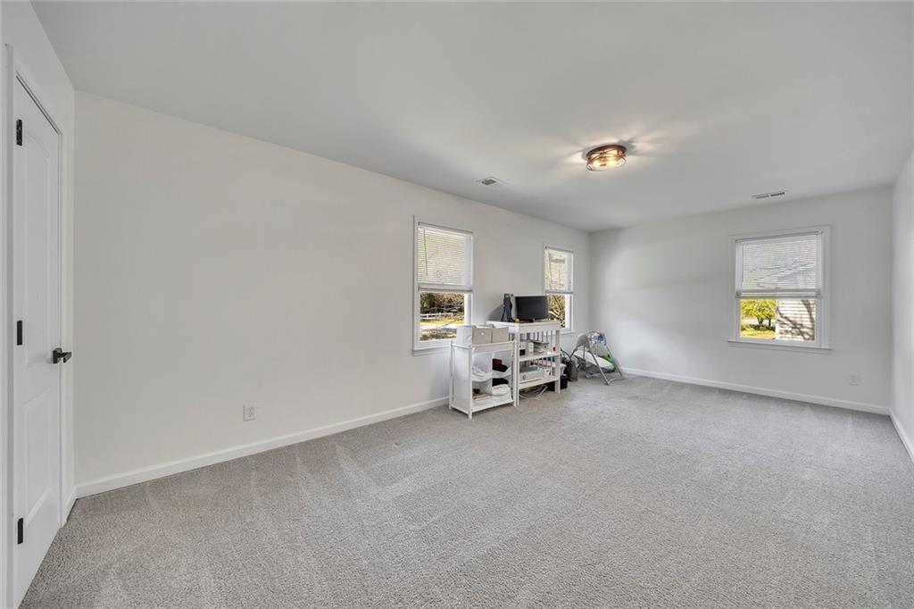 2328 Carnes Road Jonesboro, GA 30236 - Photo 23 of 36 a view of a livingroom with furniture and window