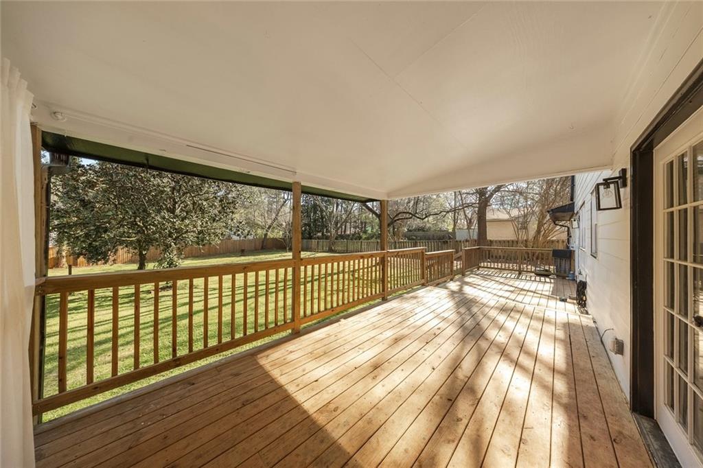 2328 Carnes Road Jonesboro, GA 30236 - Photo 30 of 36 a view of a large window with wooden floor