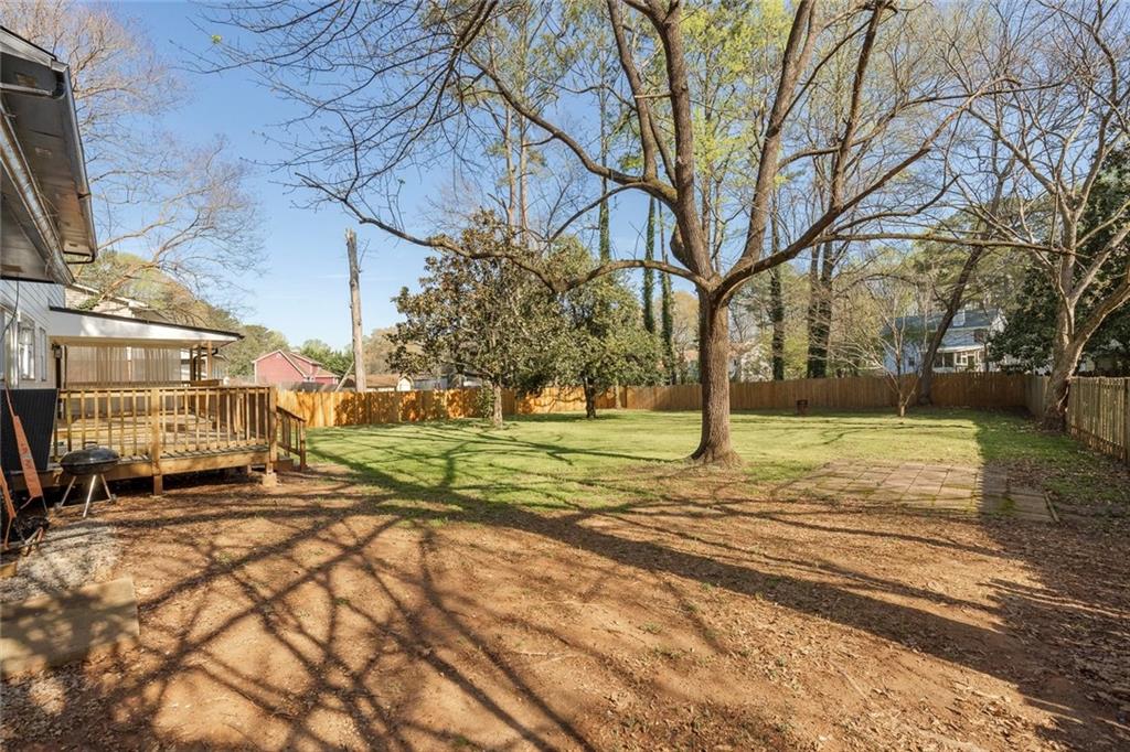 2328 Carnes Road Jonesboro, GA 30236 - Photo 32 of 36 a view of a yard with plants and trees