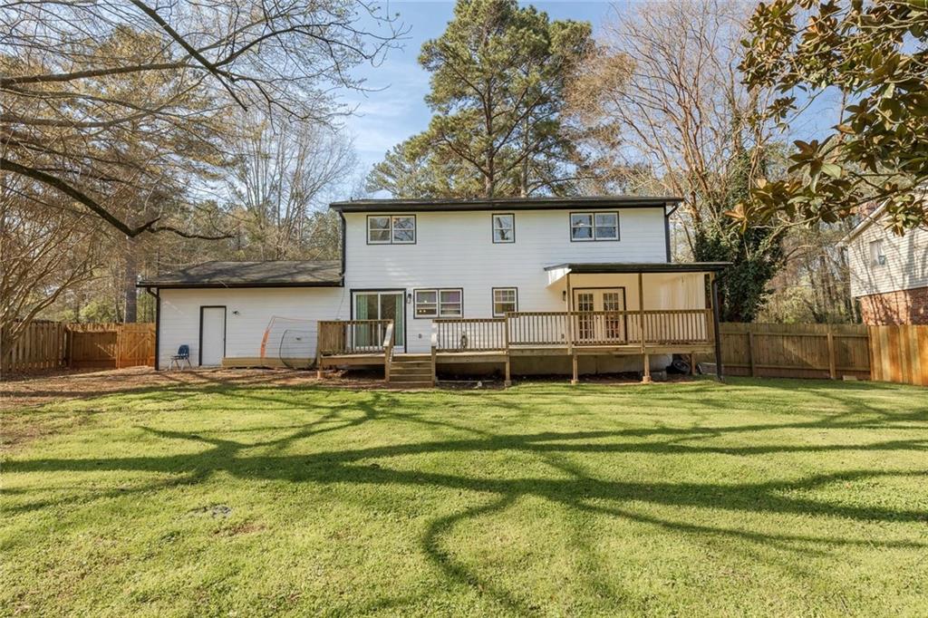 2328 Carnes Road Jonesboro, GA 30236 - Photo 34 of 36 a view of a house with a swimming pool