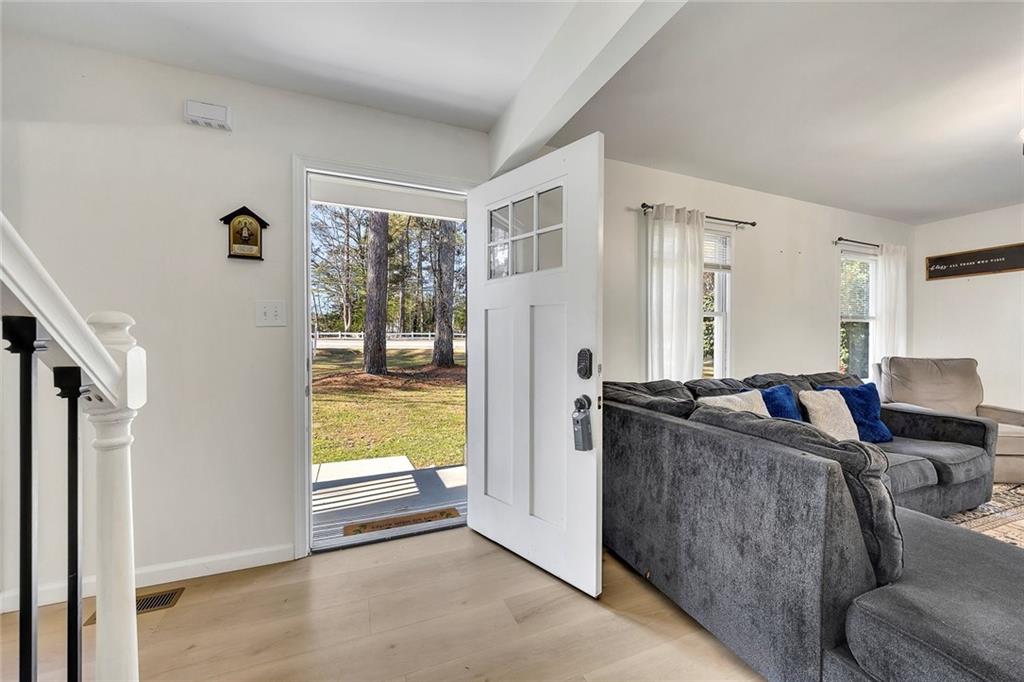 2328 Carnes Road Jonesboro, GA 30236 - Photo 4 of 36 a living room with furniture and a window