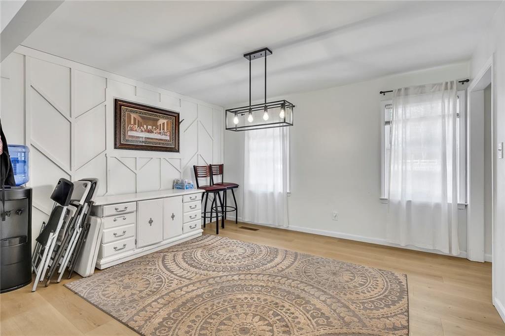 2328 Carnes Road Jonesboro, GA 30236 - Photo 9 of 36 a bedroom with furniture and windows