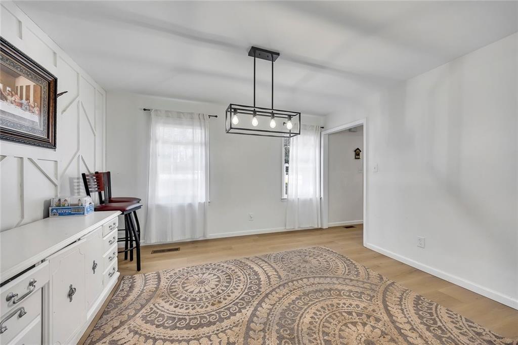 2328 Carnes Road Jonesboro, GA 30236 - Photo 10 of 36 a view of a room with window and hardwood floor
