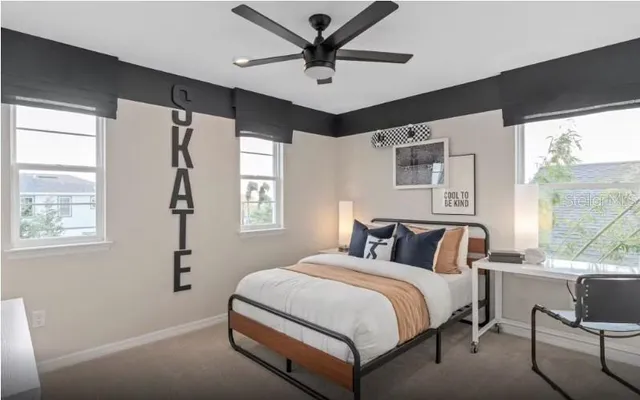 a bedroom with a bed and window