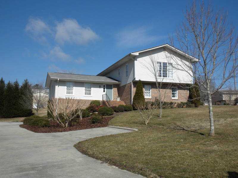 Exterior Front. This large home is on a huge corner lot and was completely rebuilt in 1998 from the ground up!