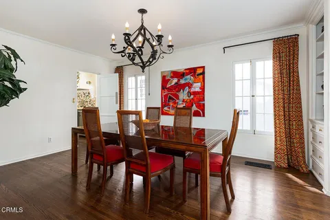 a kitchen with stainless steel appliances granite countertop a sink and a stove