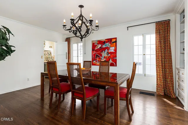 a kitchen with stainless steel appliances granite countertop a sink and a stove