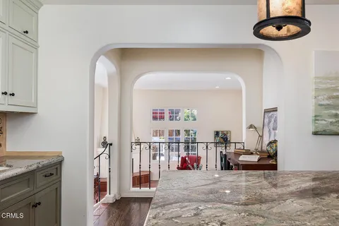 a view of a dining room with furniture and window