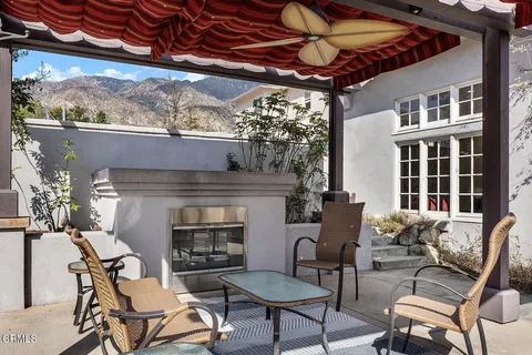 a view of a building with sitting area