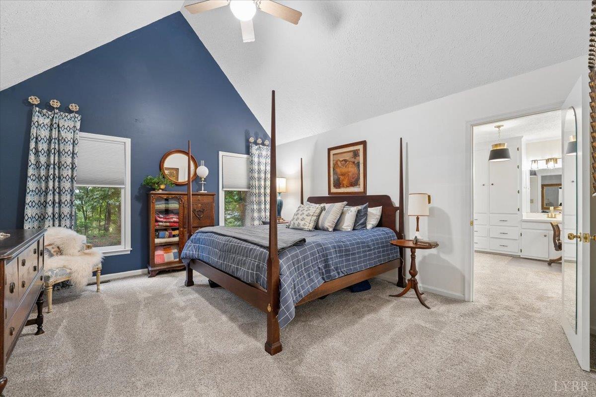 3289 Peaks Road Bedford, VA 24523 - Photo 32 of 71 a bedroom with a bed couch and a window