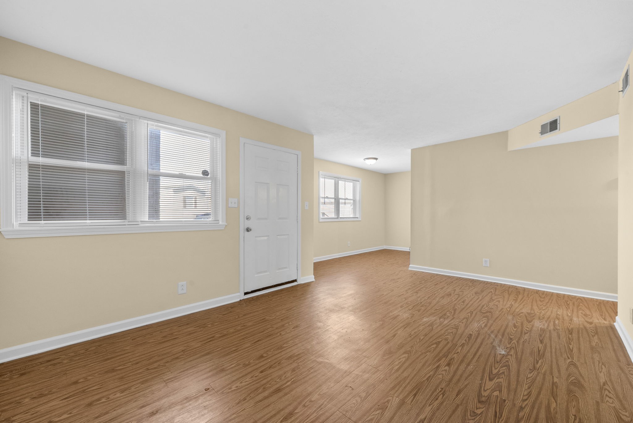 812 Pembroke Oak Grove Road, Unit 12 Oak Grove, KY 42262 - Photo 3 of 12 a view of an empty room with wooden floor and a window