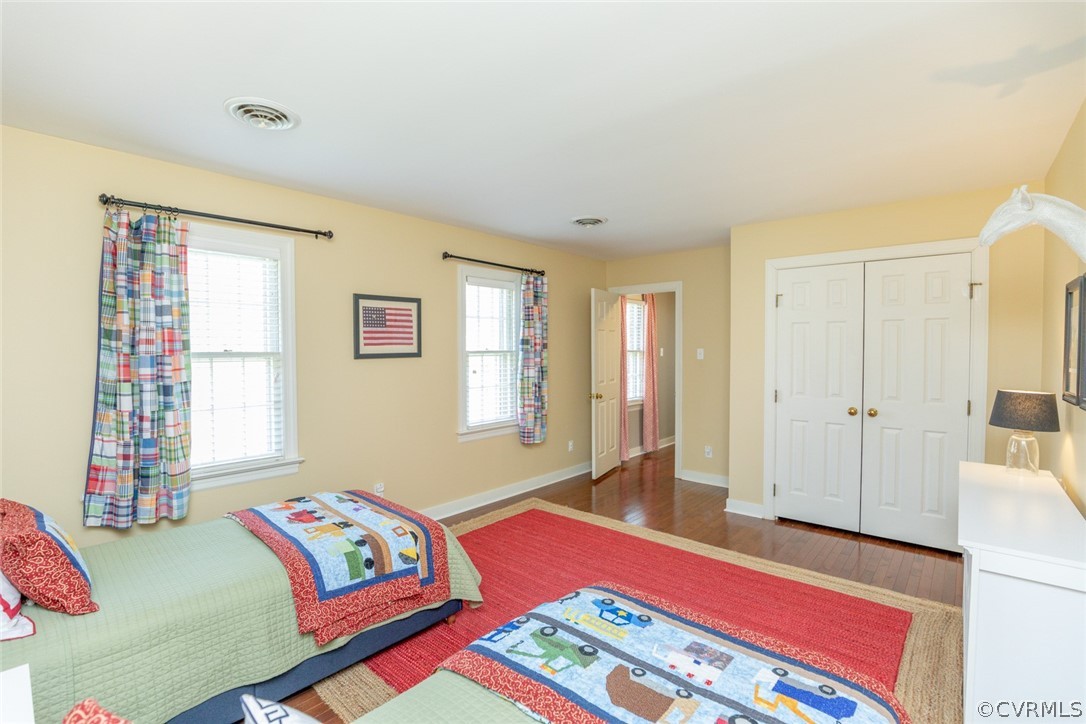 12701 Foxstone Road Midlothian, VA 23113 - Photo 23 of 34 a bedroom with a bed and a window