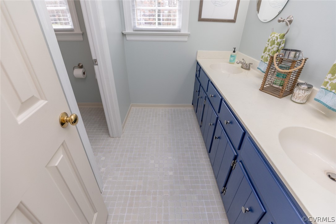 12701 Foxstone Road Midlothian, VA 23113 - Photo 26 of 34 a bathroom with sink and mirror