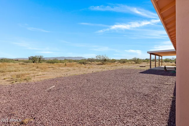a big room with wooden fence