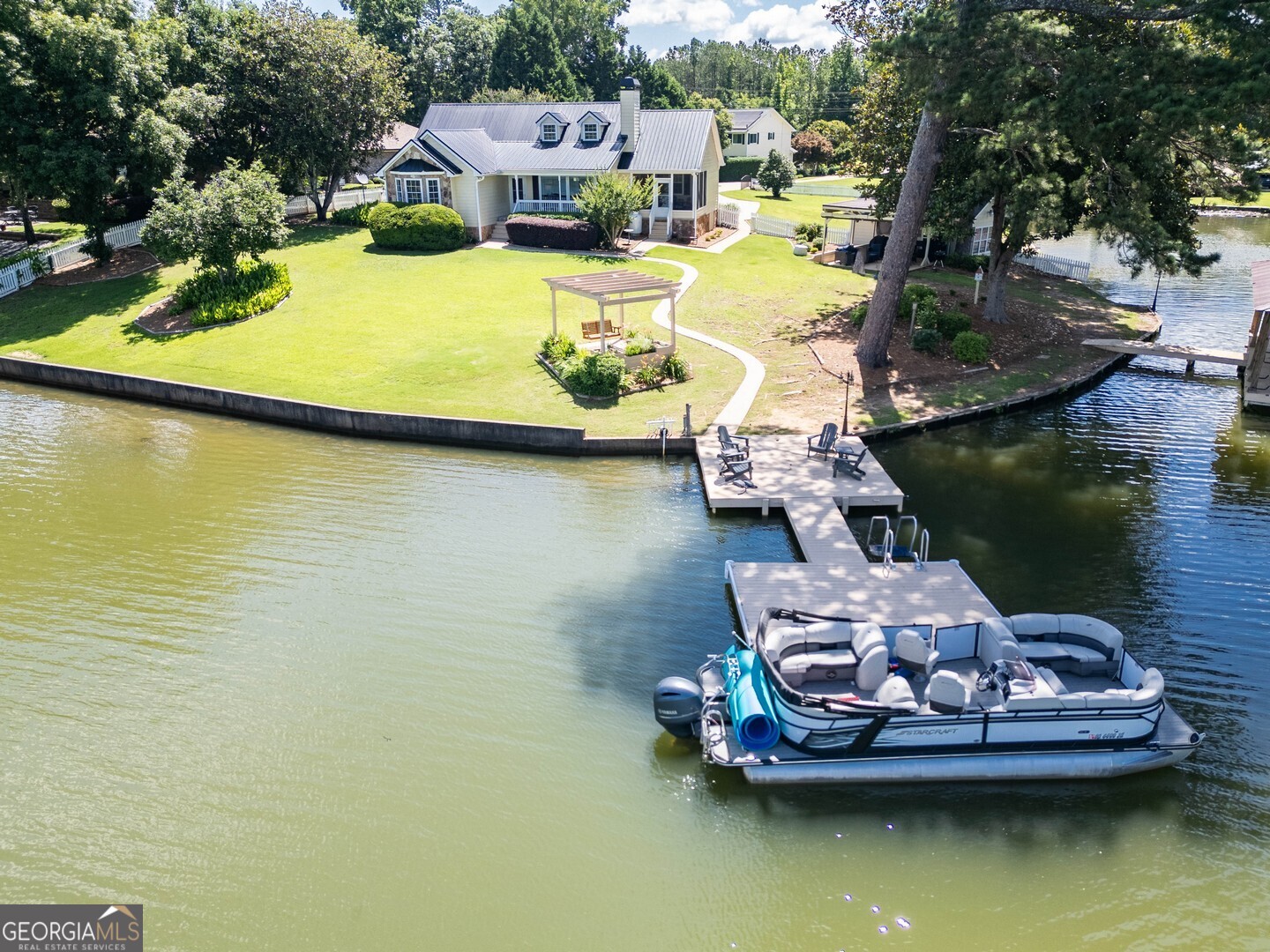 8950 Jackson Lake Road Monticello, GA 31064 - Photo 12 of 88 an aerial view of a house with a water view
