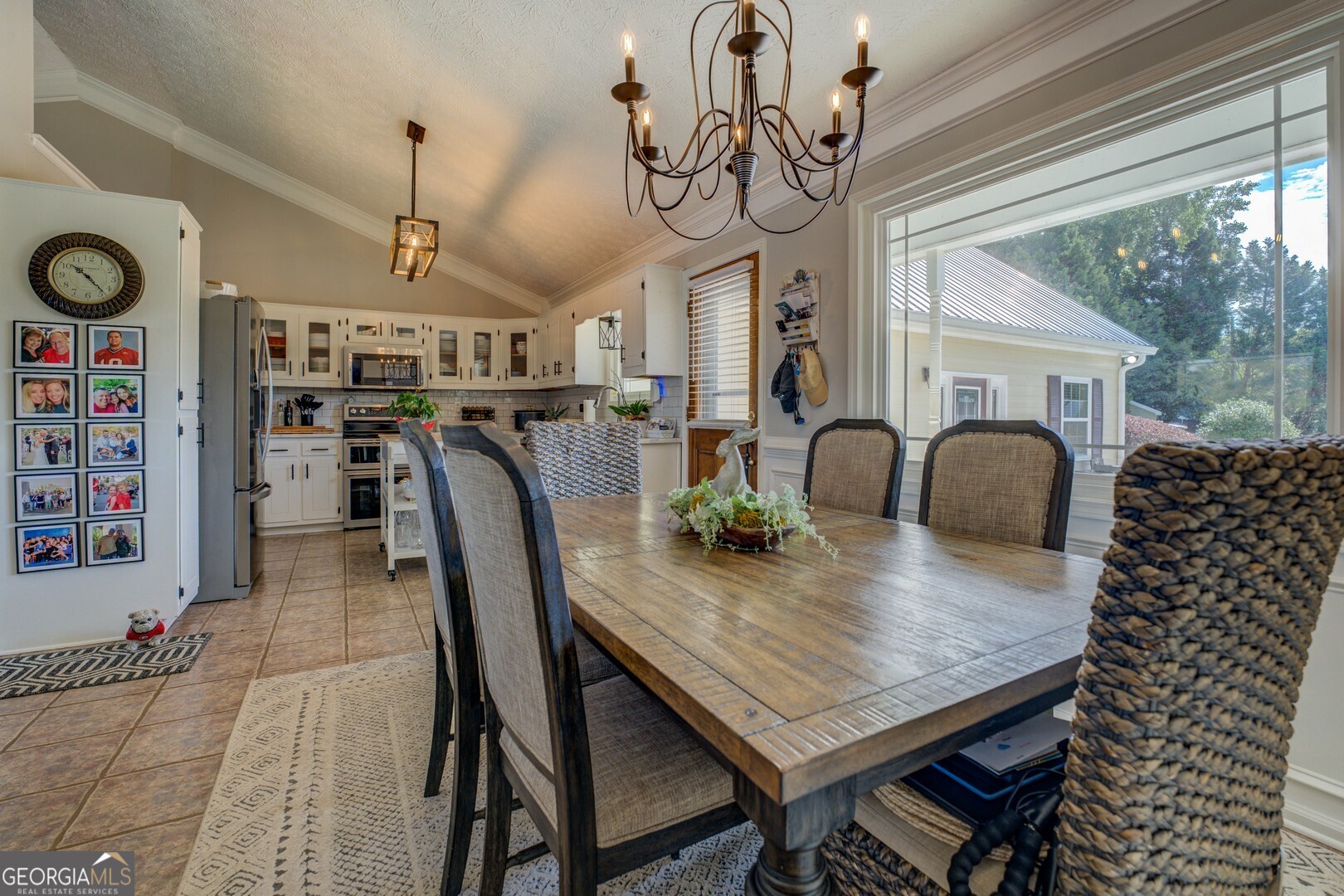 8950 Jackson Lake Road Monticello, GA 31064 - Photo 17 of 88 a view of a dining room with furniture window and outside view