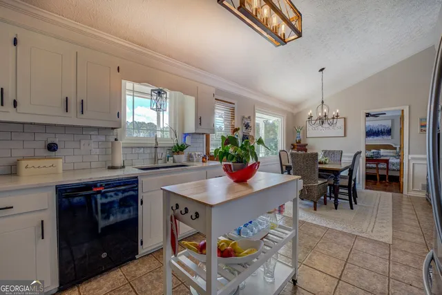 a view of a swimming pool with an outdoor space and seating area