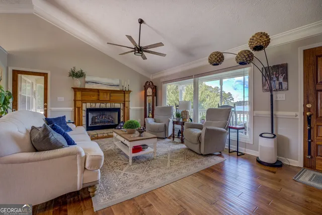 a kitchen with stainless steel appliances granite countertop a stove microwave and cabinets