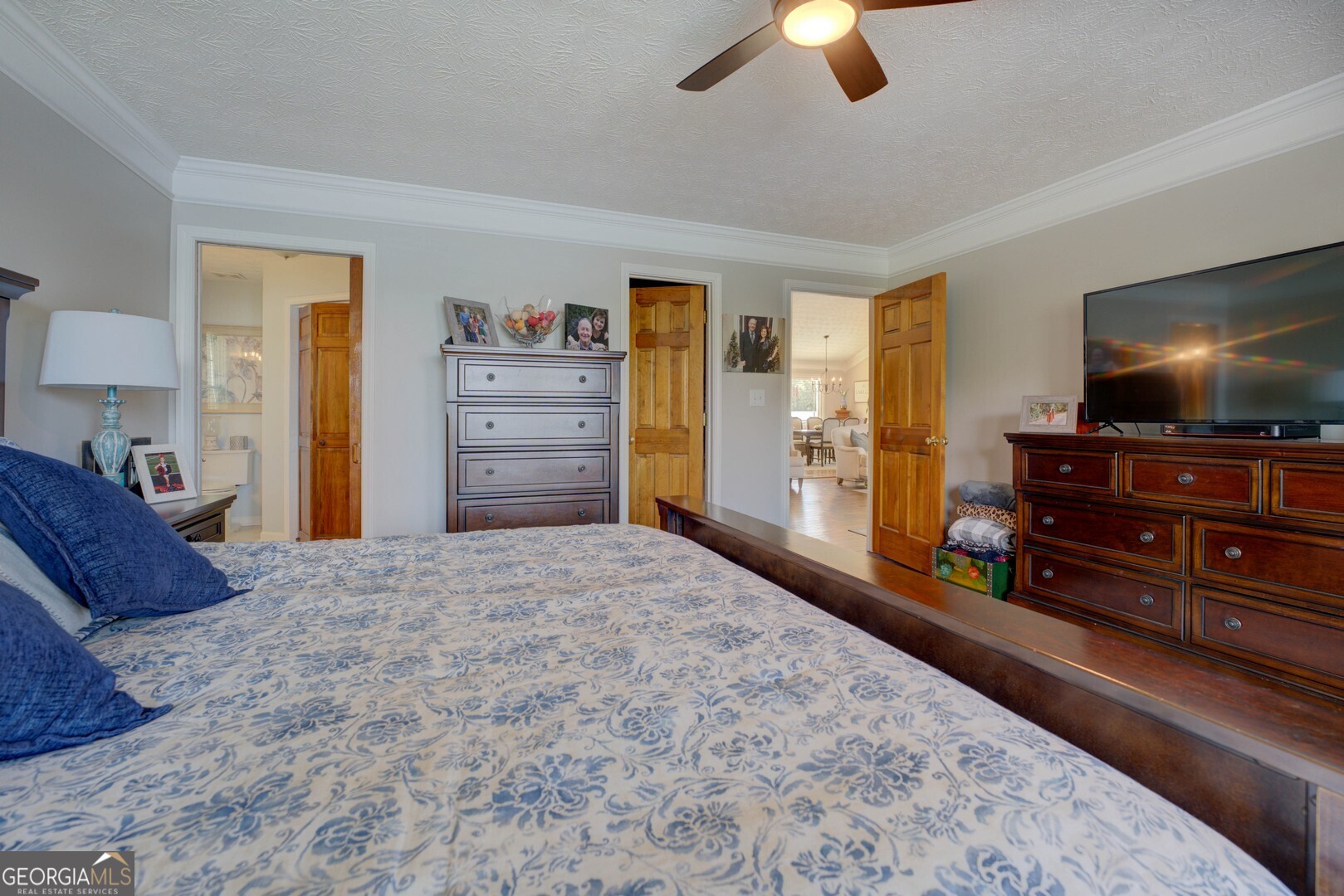 8950 Jackson Lake Road Monticello, GA 31064 - Photo 29 of 88 a bedroom with furniture and a flat screen tv