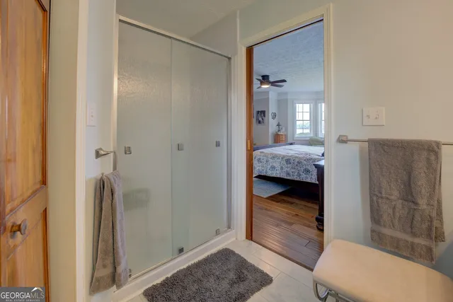 a kitchen with stainless steel appliances granite countertop a stove top oven a sink and cabinets