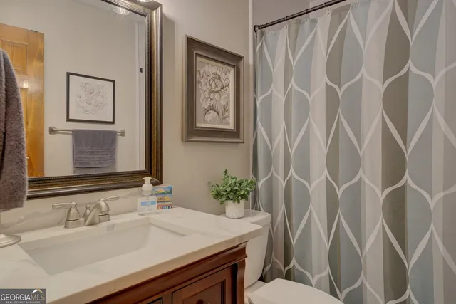 a kitchen with stainless steel appliances granite countertop a sink and a cabinets