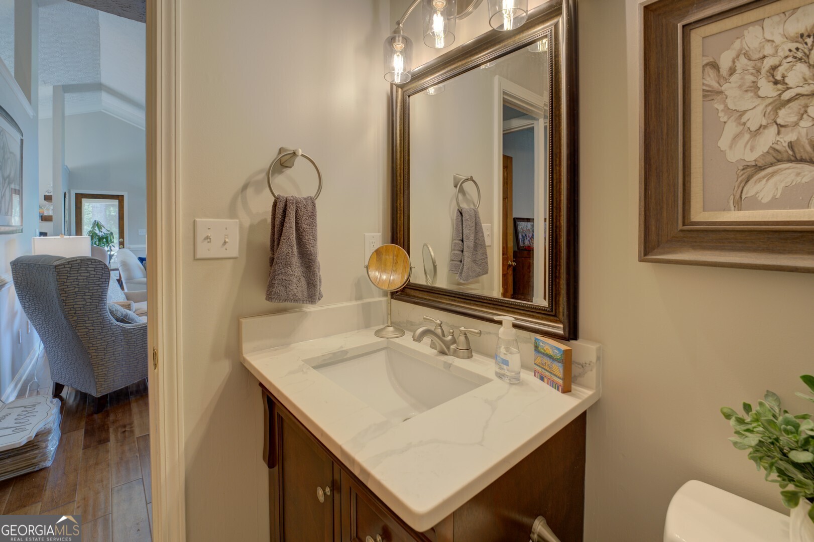 8950 Jackson Lake Road Monticello, GA 31064 - Photo 36 of 88 a bathroom with a sink vanity and a mirror