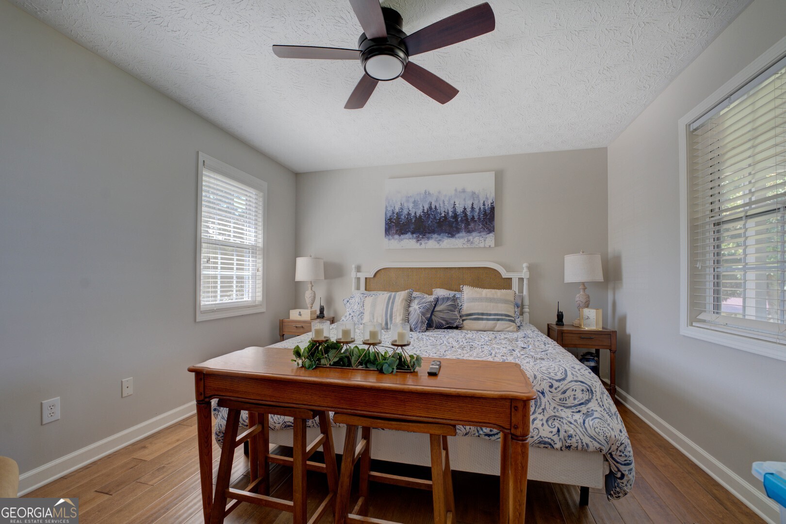 8950 Jackson Lake Road Monticello, GA 31064 - Photo 37 of 88 a view of a dining room with furniture window and wooden floor