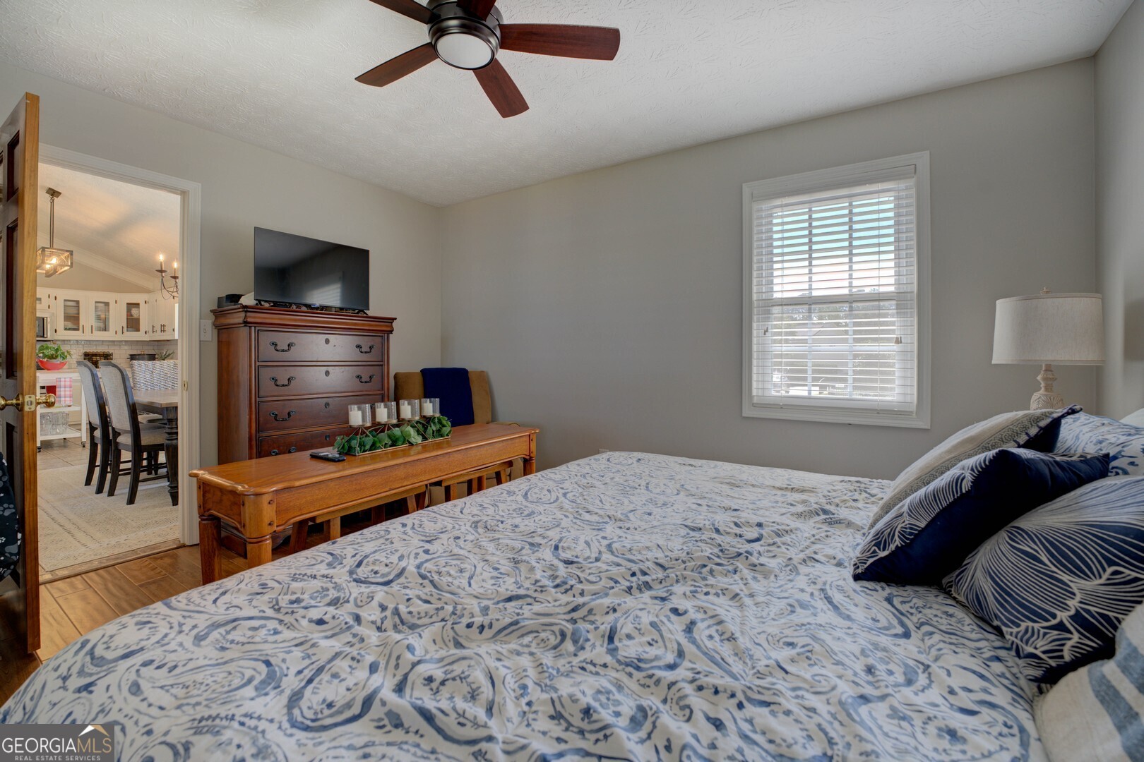 8950 Jackson Lake Road Monticello, GA 31064 - Photo 38 of 88 a bedroom with a bed and flat screen tv