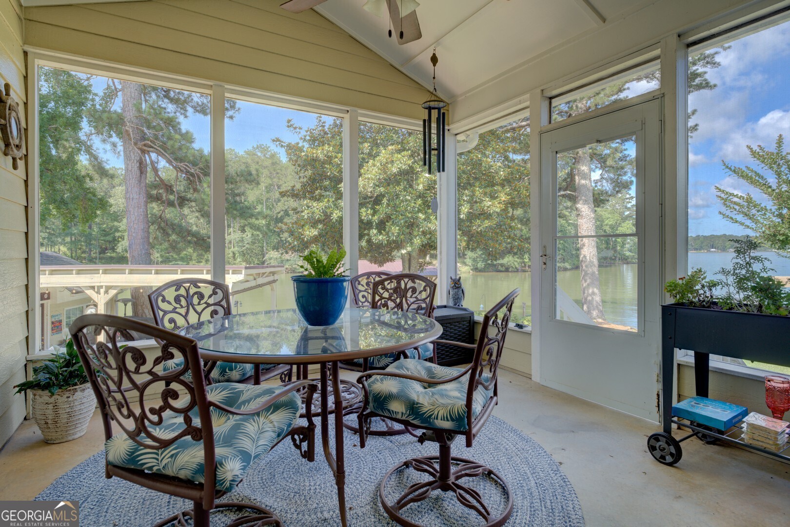 8950 Jackson Lake Road Monticello, GA 31064 - Photo 39 of 88 a view of a dining room with furniture window and outside view