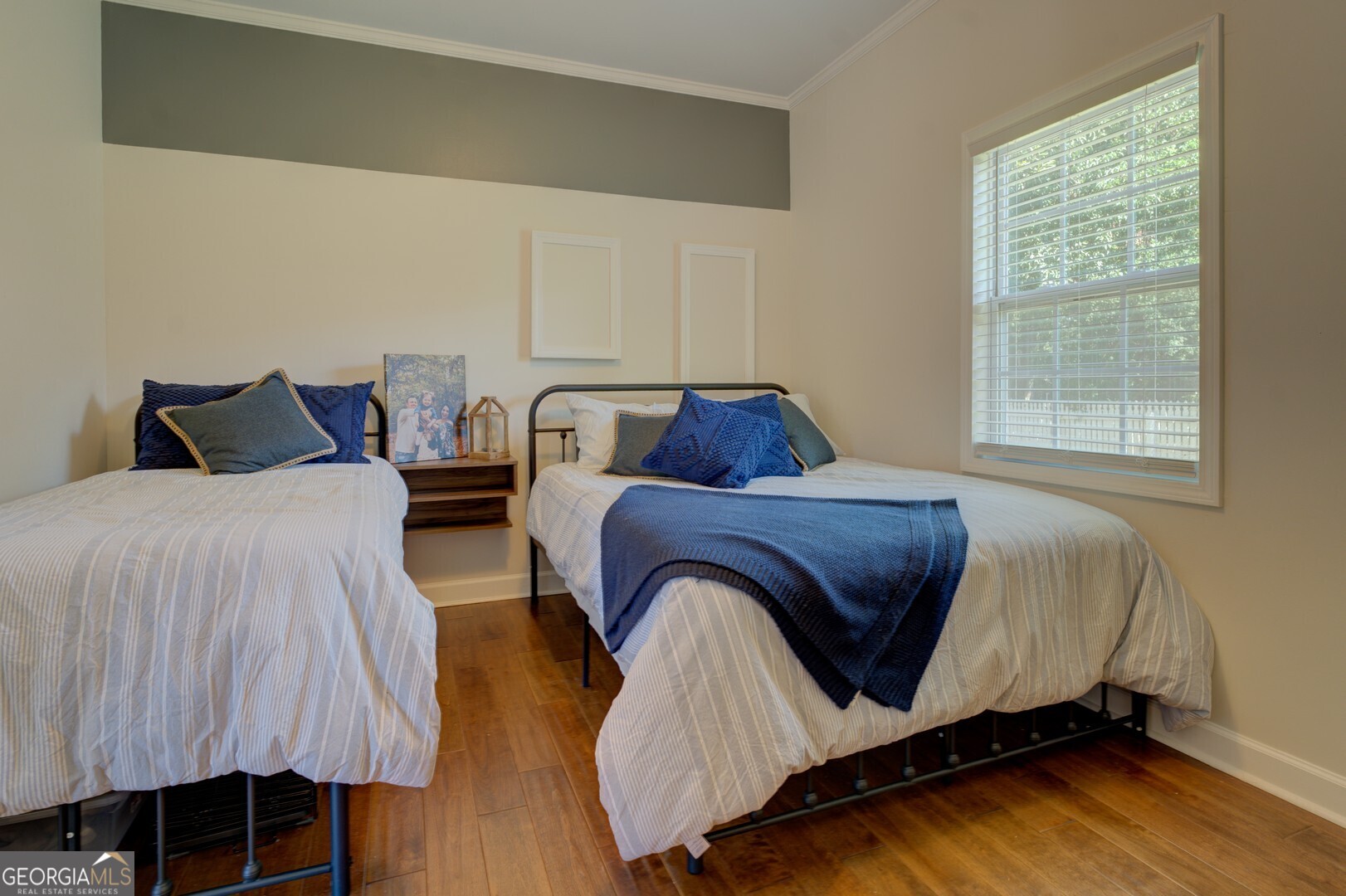 8950 Jackson Lake Road Monticello, GA 31064 - Photo 50 of 88 a bedroom with two beds and wooden floor