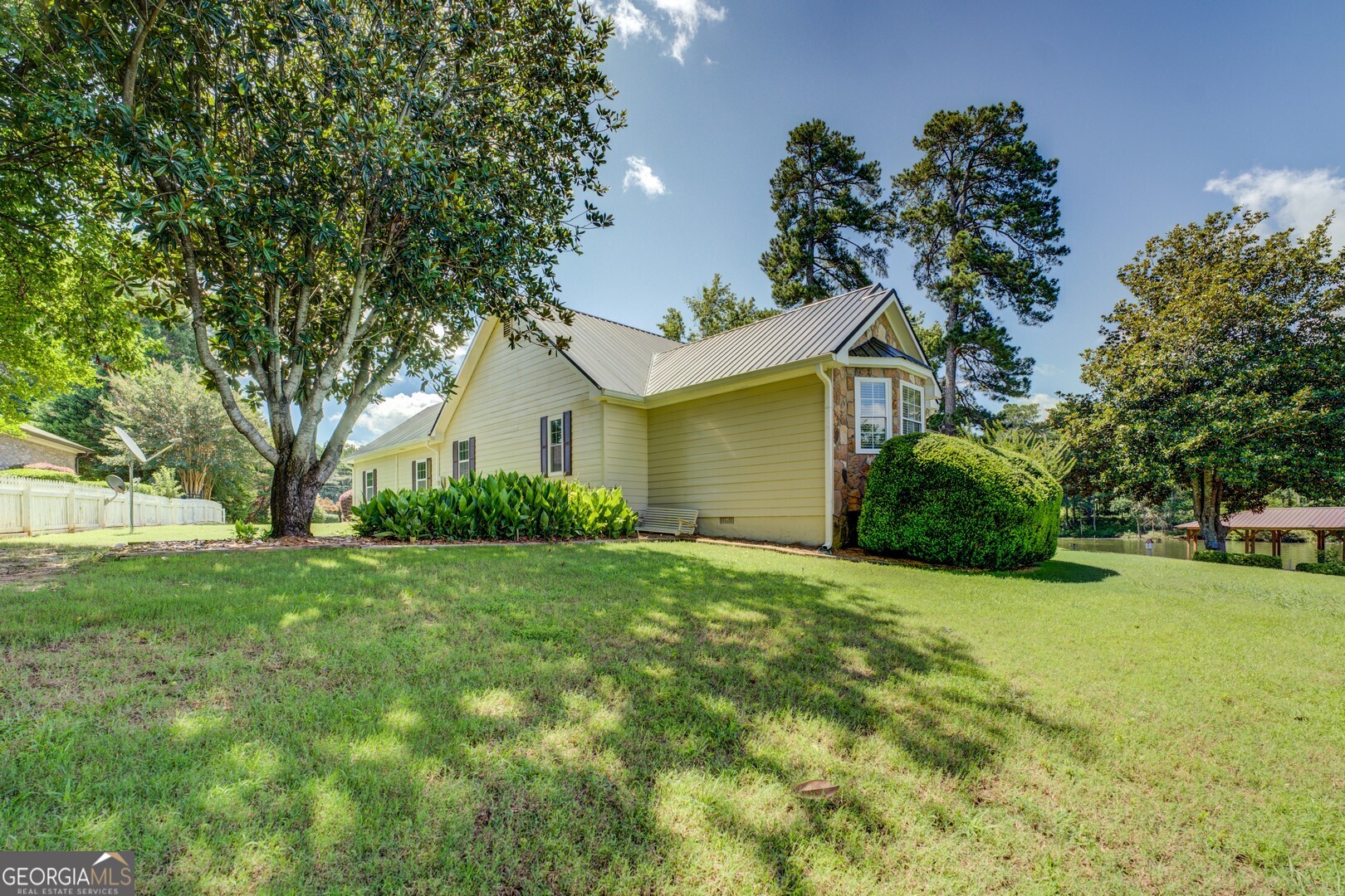 8950 Jackson Lake Road Monticello, GA 31064 - Photo 79 of 88 a view of a house with yard and tree s