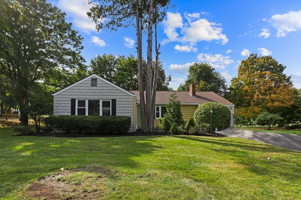 1177 Bay Road Sharon, MA 02067 - Photo 1 of 27 a front view of a house with a yard