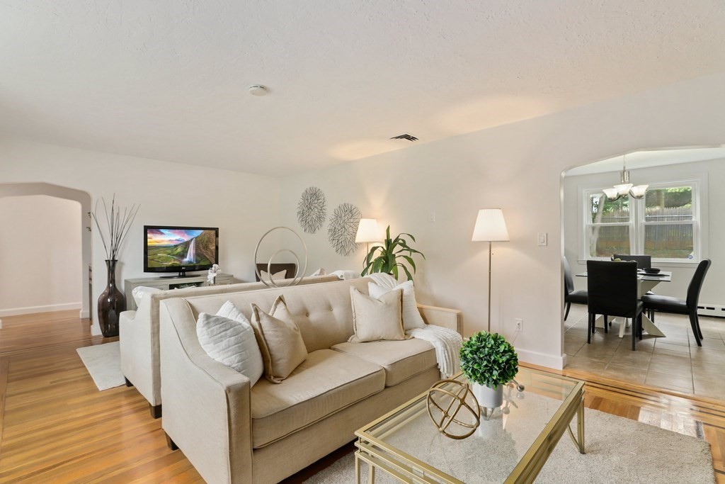 1177 Bay Road Sharon, MA 02067 - Photo 5 of 27 a living room with furniture and a flat screen tv