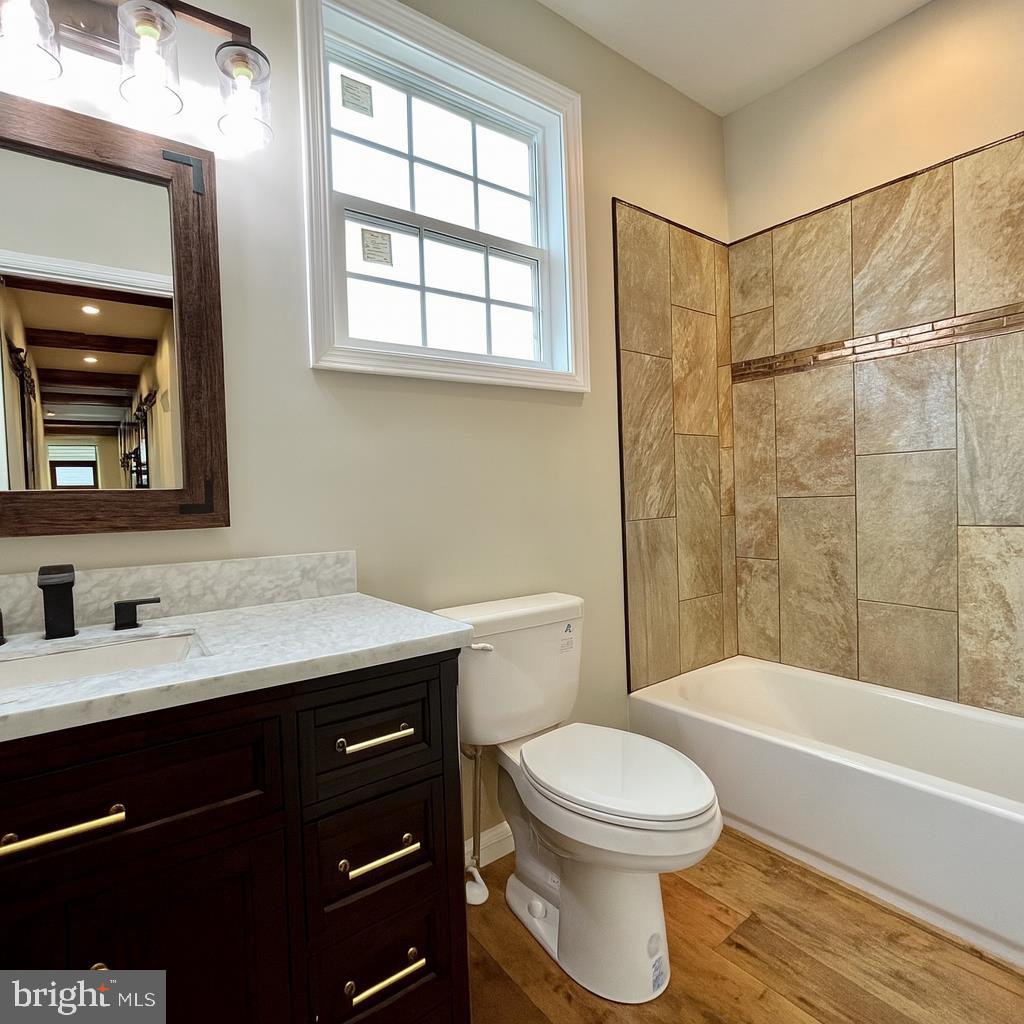 6 Antioch Road Luray, VA 22835 - Photo 16 of 39 a bathroom with a toilet a sink and bathtub