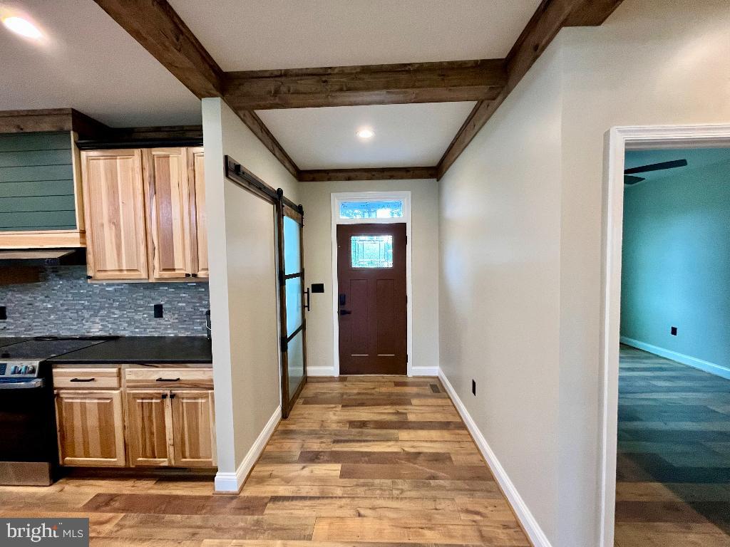 6 Antioch Road Luray, VA 22835 - Photo 25 of 39 a view of a hallway with wooden floor and staircase