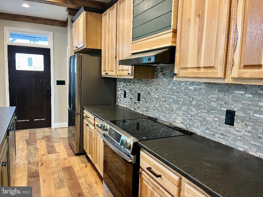 6 Antioch Road Luray, VA 22835 - Photo 30 of 39 a kitchen with granite countertop a sink a counter top space and cabinets