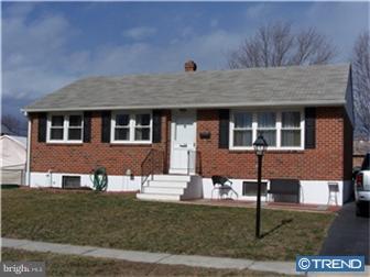 1130 Musket Road Newark, DE 19713 - Photo 1 of 12 a front view of a house with garden