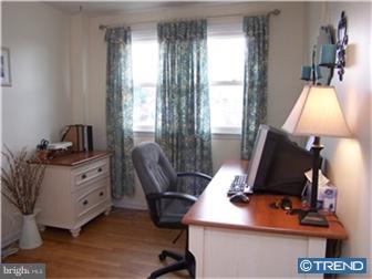 1130 Musket Road Newark, DE 19713 - Photo 10 of 12 a view of a workspace with furniture and a window