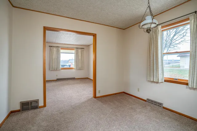 a view of a room that has a window