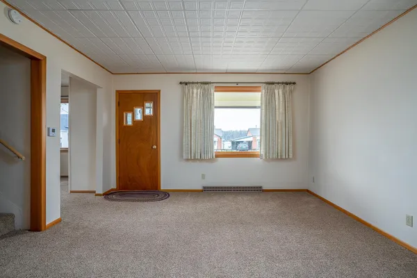 an empty room with window