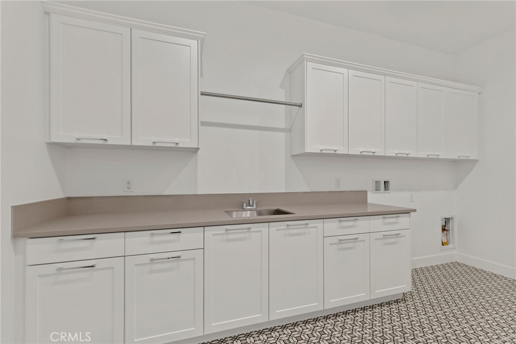11910 Red Hawk Lane Porter Ranch, CA 91326 - Photo 16 of 21 Laundry Room: Alta Loma Italianate - Ridge Collection at Bella Vista - Photo of another Alta Loma - Not actual home for sale - Home is still under construction