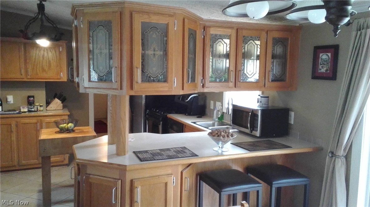 3450 Shepard Road Perry, OH 44081 - Photo 20 of 24 Access the dining ware from the formal dining room.