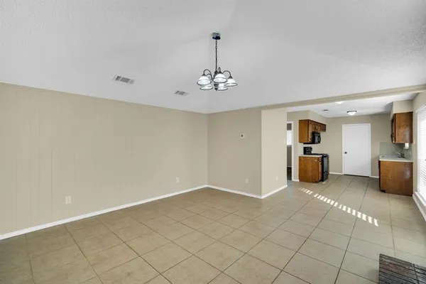 a view of a livingroom with a furniture