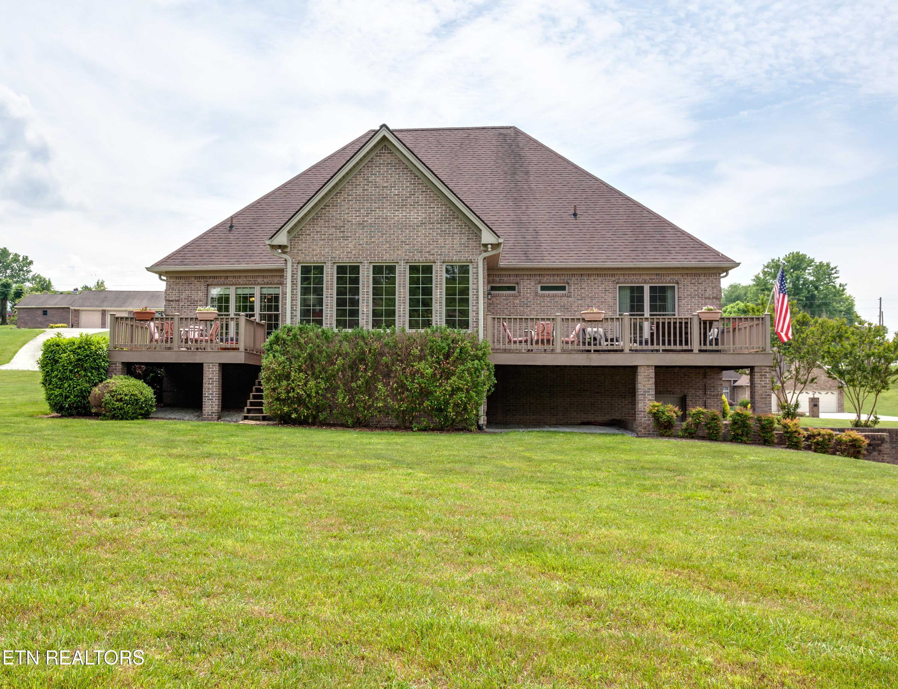 135 Deevel Boulevard Harrogate, TN 37752 - Photo 6 of 36 2 outdoor decks split by sunroom